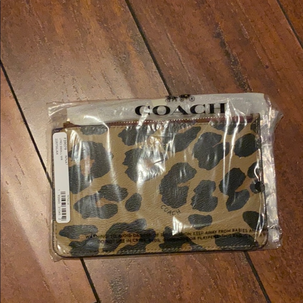 Coach leopard wristlet NWT